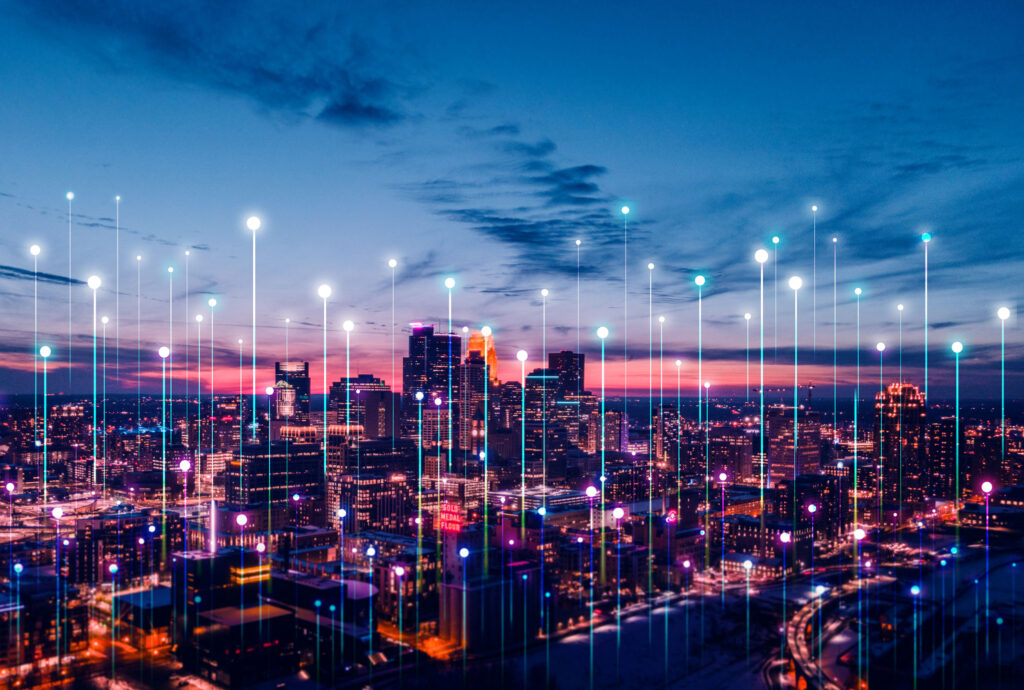 decorative image of a city with technology elements